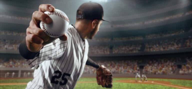 the pitcher throws ball on baseball stadium