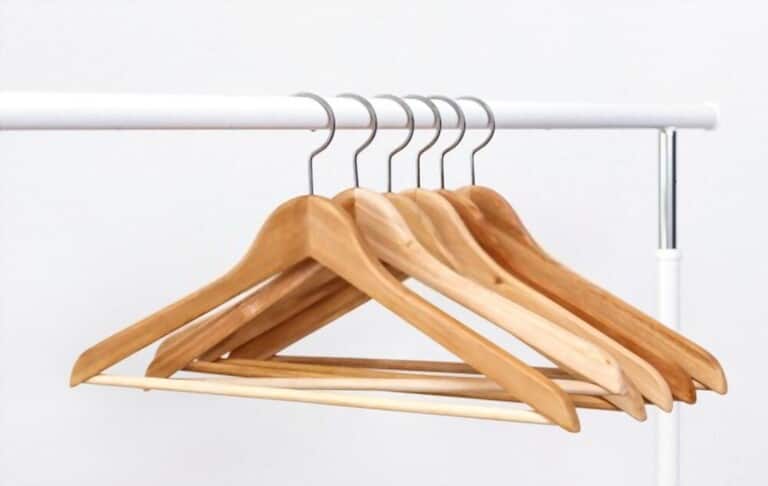 soft wooden hangers for hanging clothes on white background soft wooden hangers for hanging clothes on white background