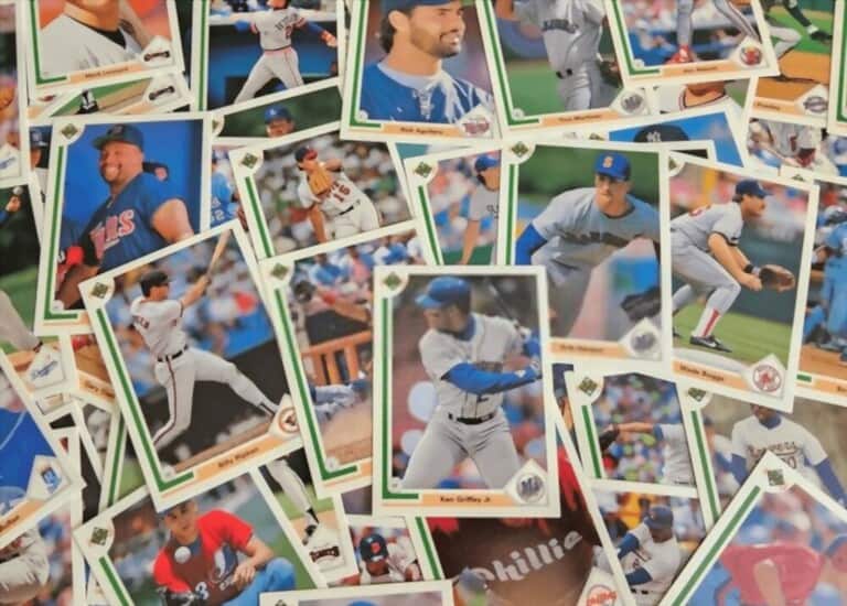 Baseball cards are collected stacked on top of each other