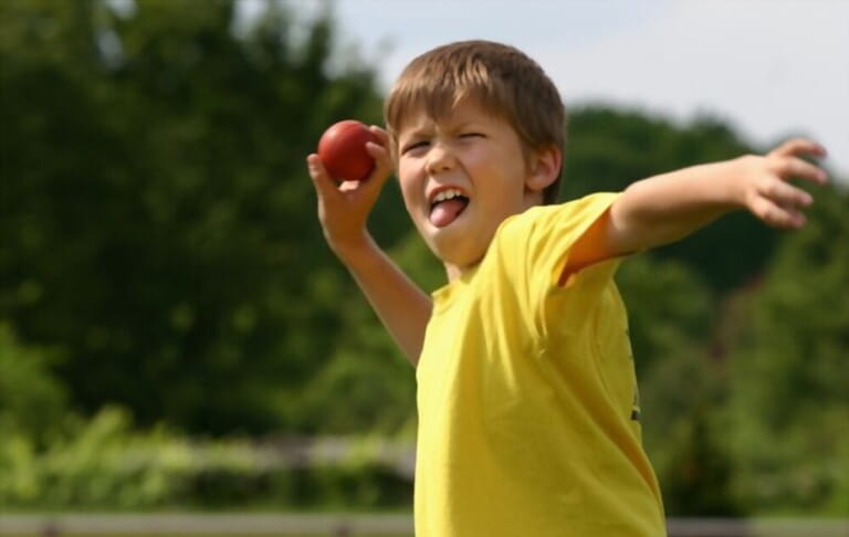 cute boy throwing ball cute boy throwing ball