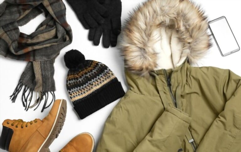 set stylish winter clothes on white background