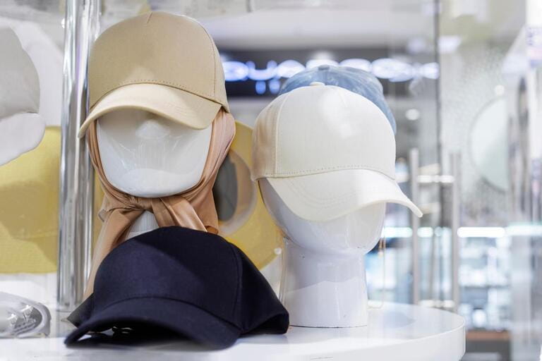 stylish men's summer baseball hat in a hat shop. stylish men's summer baseball hat in a hat shop.