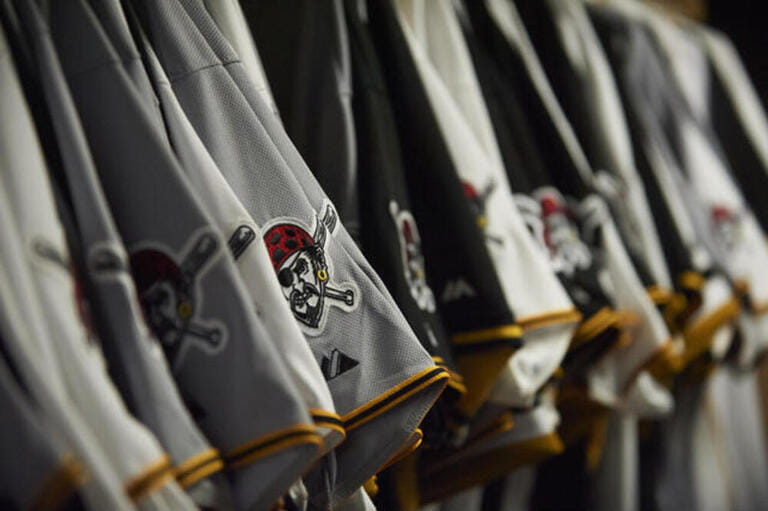 Pittsburgh Pirates jerseys are lined up in the equipment room at PNC Park