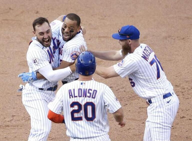 New York Mets players Pete Alonso and Michael Conforto celebrate with Dominic Smith who hits a walk off game winning RBI single in the bottom of the 8th inning in game one of a double header against the Philadelphia Phillies at Citi Field on Friday New York Mets players Pete Alonso and Michael Conforto celebrate with Dominic Smith who hits a walk off game winning RBI single in the bottom of the 8th inning in game one of a double header against the Philadelphia Phillies at Citi Field on Friday