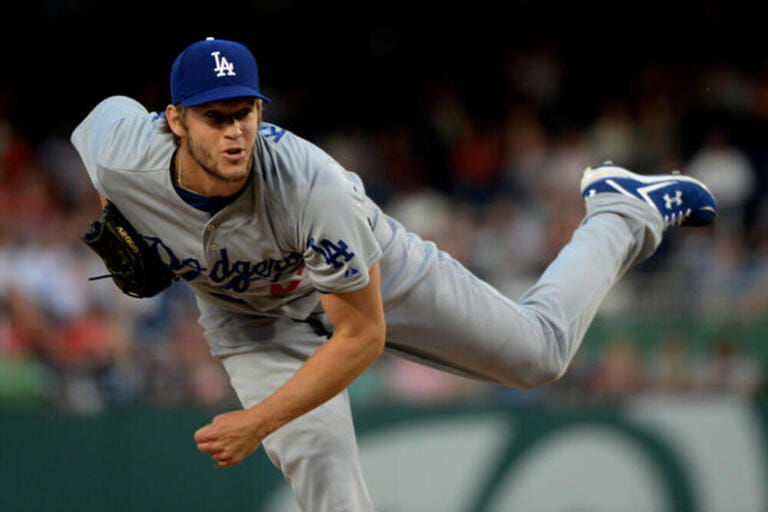 Los Angeles Dodgers Clayton Kershaw delivers a pitch during the fourth inning of game against the Washington Nationals at Nationals Stadium in Washington, DC