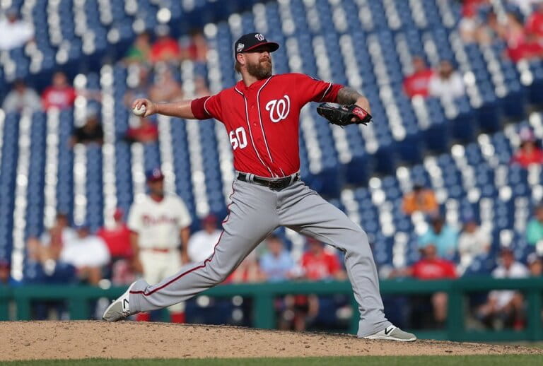 Justin Miller #60 of the Washington Nationals throws a pitch in the 13th inning during a game against the Philadelphia Phillies at Citizens Bank Park on July 1, 2018 in Philadelphia, Pennsylvania. The Phillies won 4-3 in 13 innings.