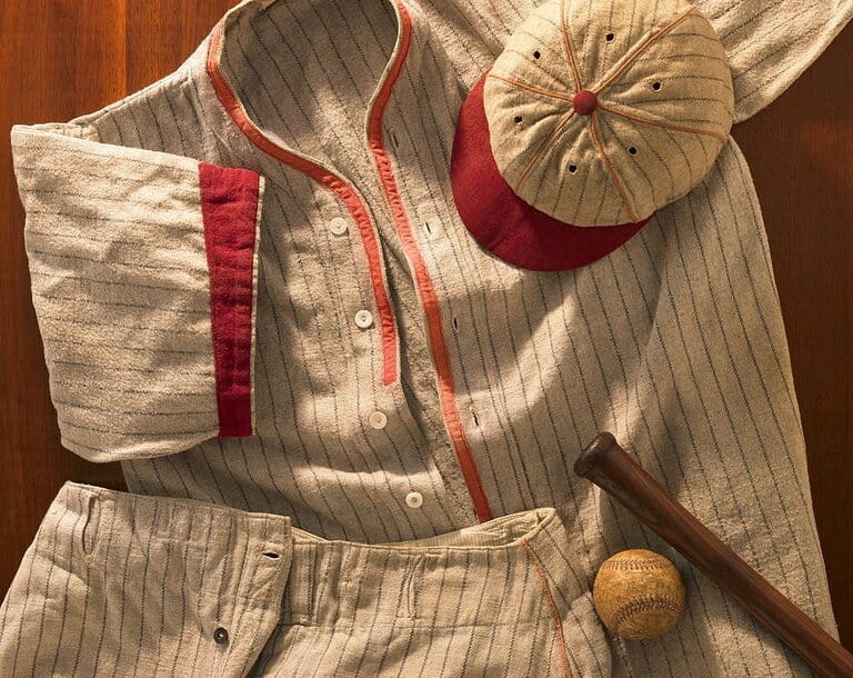 Old-fashioned wool baseball uniform with hat, pants and bat