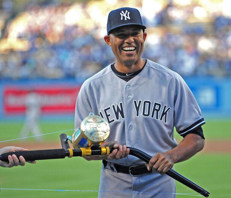 Los Angeles, California, USA. 31st July 2013. New York Yankees relief pitcher Mariano Rivera #42 is honored in a presentation and presented with a fishing reel and rod before the Major League Baseball game between the Los Angeles Dodgers and the New York Yankees at Dodger Stadium