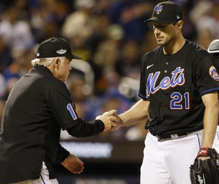 New York, USA. 07th Oct, 2022. New York Mets pitcher Max Scherzer hands the ball to manager Buck Showalter as he is taken out of the game after San Diego Padres Jurickson Profar hit a three-run home run in the fifth inning to give the Padres a 6-0 lead during game one of the American League wild-card series at Citi Field in New York City on Friday, October 7, 2022