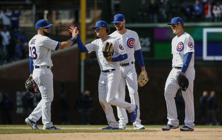 Chicago Cubs players celebrate after defeating the Los Angeles Angels at Wrigley Field Chicago Cubs players celebrate after defeating the Los Angeles Angels at Wrigley Field