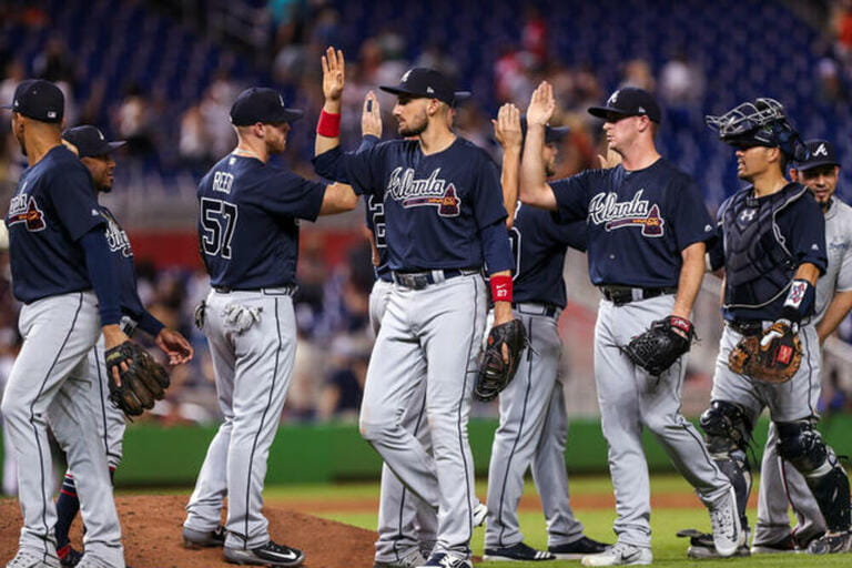 he Atlanta Braves celebrate their team's victory of an MLB game against the Miami Marlins at the Marlins Park, in Miami, Florida. The Braves won 12-1. 