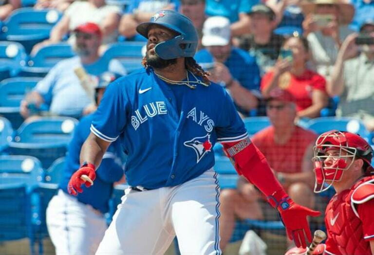 oronto Blue Jays' Vladimir Guerrero Jr. lifts a ball to the outfield during a spring training game at TD Ballpark in Dunedin, Fla., Monday, March 27, 2023.