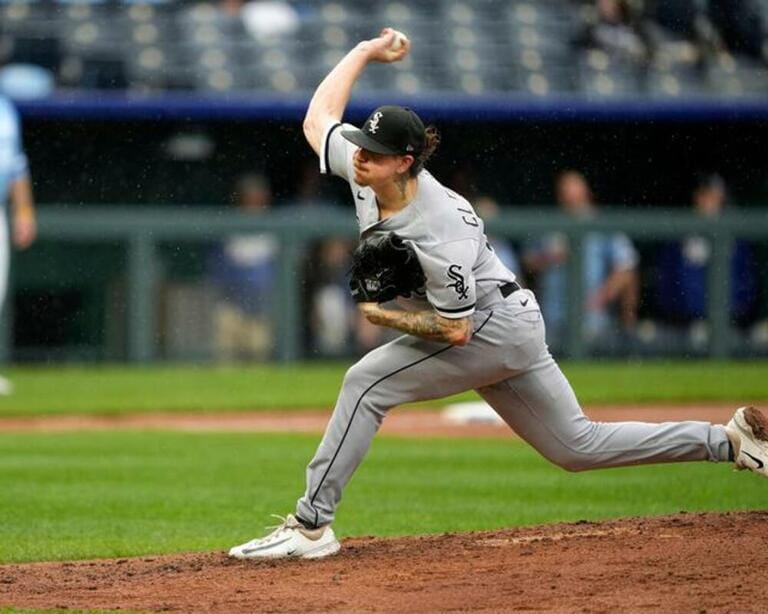 Chicago White Sox starting pitcher Mike Clevinger (52) delivers a pitch at Kauffman Stadium Kansas City, Missouri
