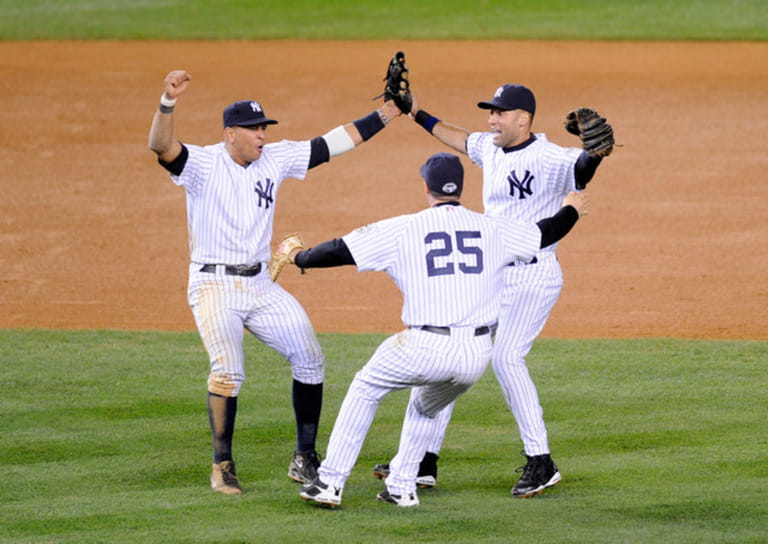 Derek Jeter #2, Alex Rodriguez #13 and Mark Teixeira #25 of the New York Yankees celebrate after defeating the Los Angeles Angel Derek Jeter #2, Alex Rodriguez #13 and Mark Teixeira #25 of the New York Yankees celebrate after defeating the Los Angeles Angel